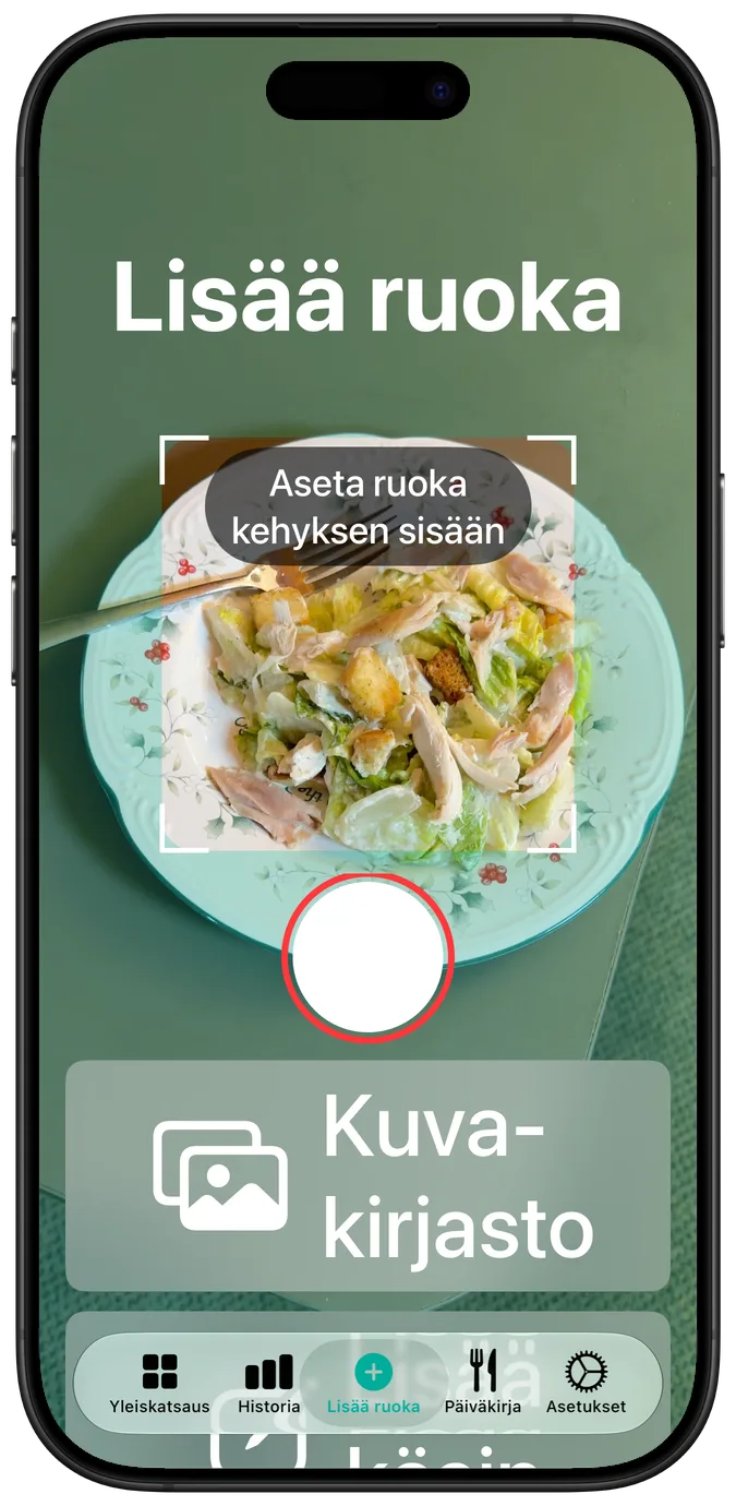 Kameranäkymä suurimmalla käyttöavun tekstikoolla: salaatti kuvassa ja suljin- ja kuvakirjastopainike pinottuina sen alle