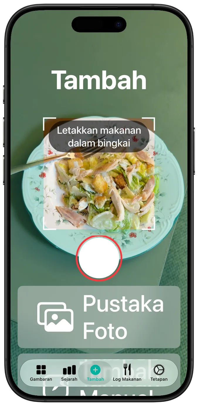 Skrin kamera pada saiz teks kebolehcapaian terbesar, salad dalam bingkai serta butang pengatup dan pustaka foto disusun di bawahnya